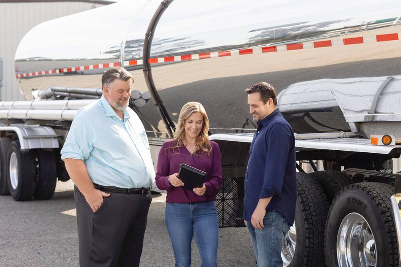 Nicole Grimm, Ben, and Adam Karp at Cherokee Freight Lines tanker yard